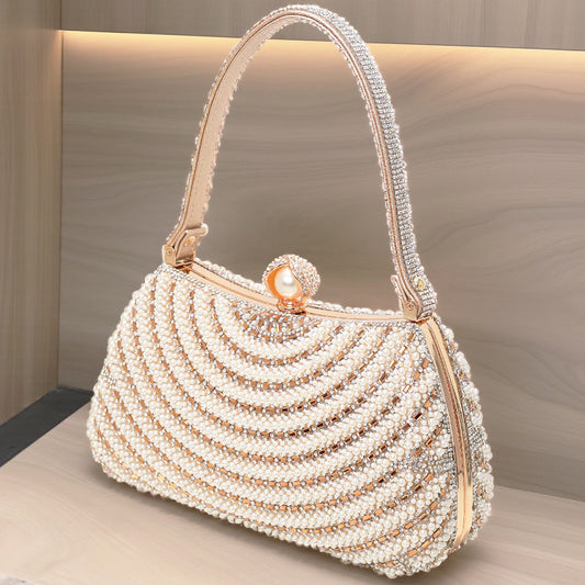 Elegant beaded handbag with pearl accents on a neutral background